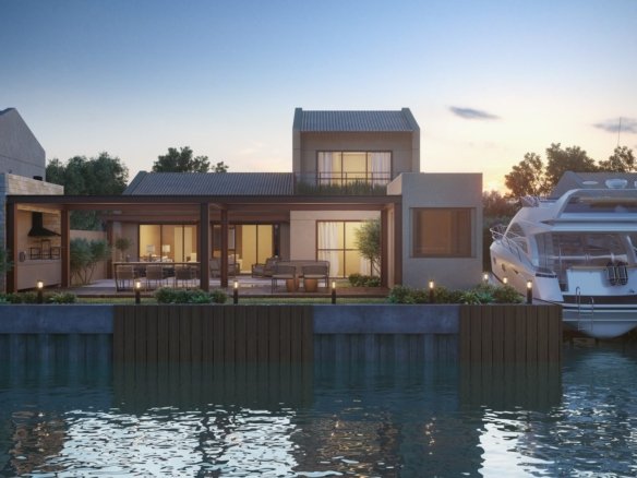 Casa tipo duplex de frente para o canal, ao entardecer, com uma lancha atracada, no Toriba (imagem ilustrativa)
