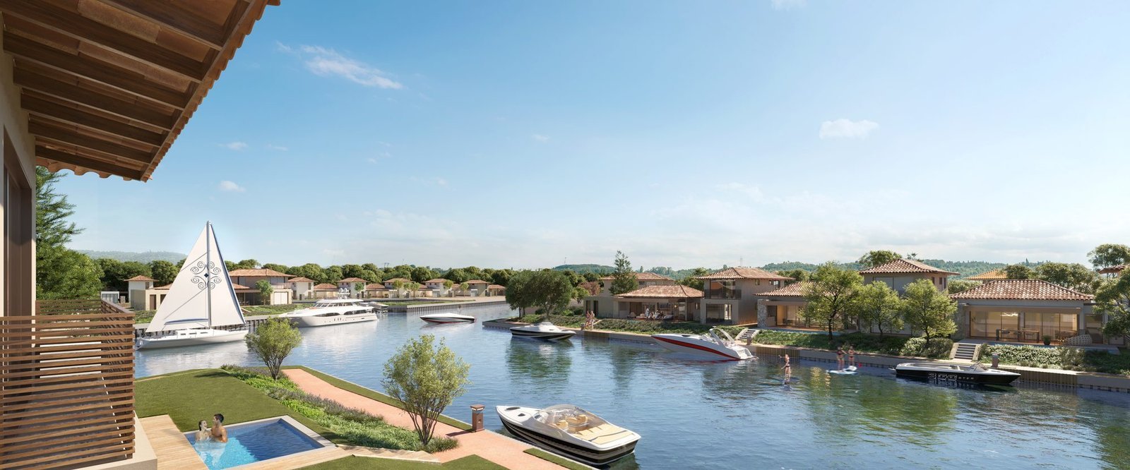 phoco-6308 Canal do Toriba visto de uma varanda, com veleiro, lanchas e casas à margem (imagem ilustrativa)