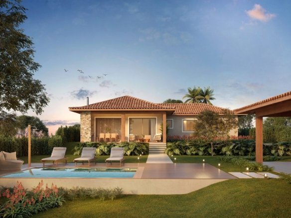 Fundos de uma casa térrea do Vista Ybirá ao entardecer, com piscina e deck, que são itens opcionais (imagem ilustrativa)